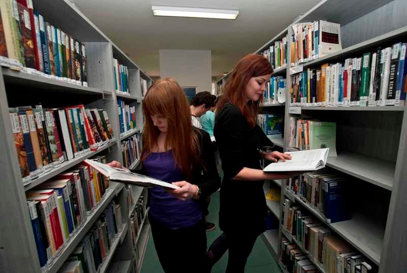 Students studying in a university library